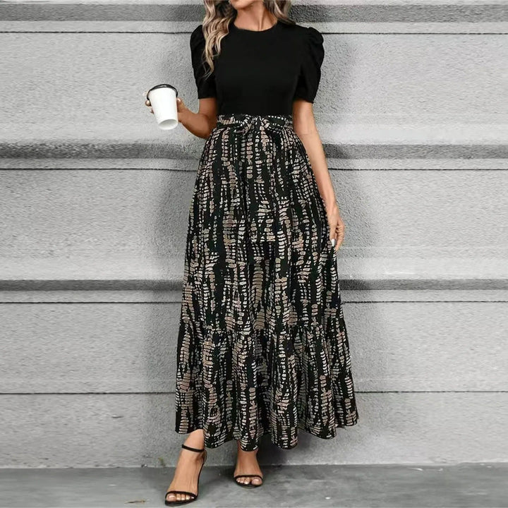 Stylish women's botanical print maxi sundress for a chic summer look. Flowy design for comfort.