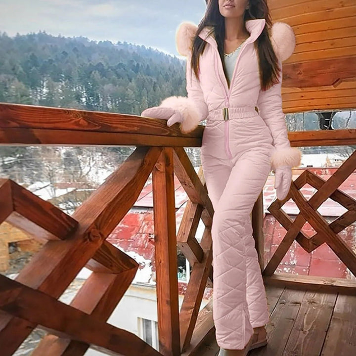 Comfortable women's winter ski jumpsuit, featuring secure zipper closure. Perfect snow gear for active women.