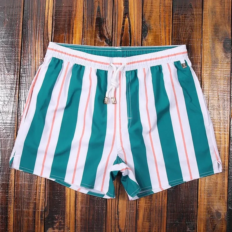 Versatile men's swim shorts: comfortable beachwear, quick-dry fabric for stylish summer and vacation style.