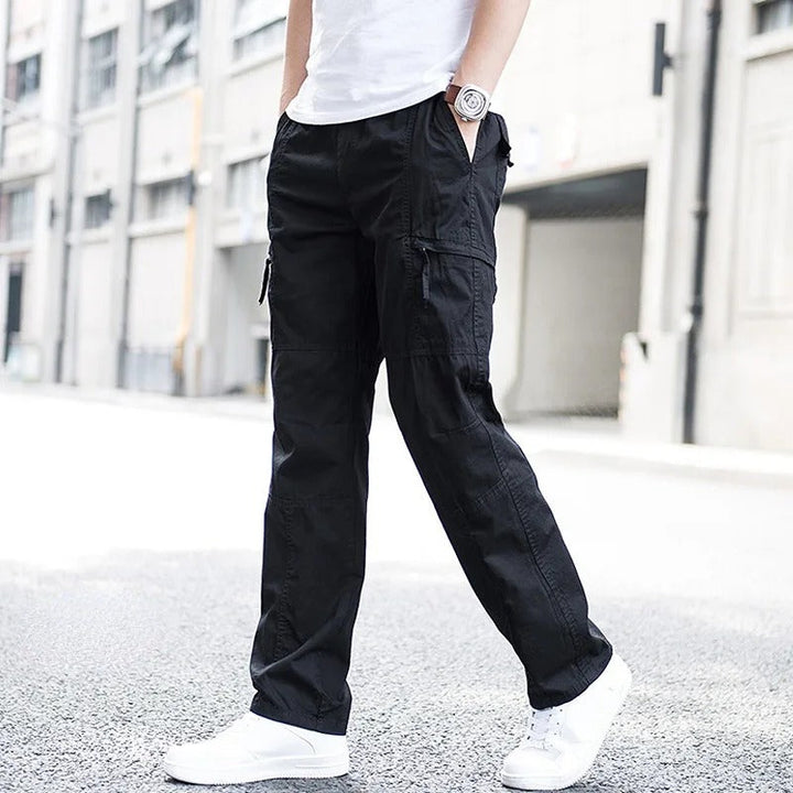 Khaki men's cargo utility pants with multiple pockets, comfortable for casual wear & everyday fashion.