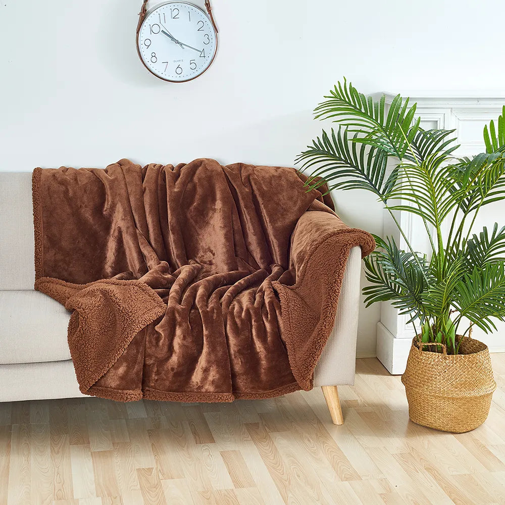 Stylish waterproof pet furniture protector blanket, great for dogs & cats, blending with home decor.