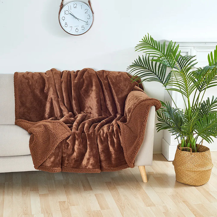Stylish waterproof pet furniture protector blanket, great for dogs & cats, blending with home decor.