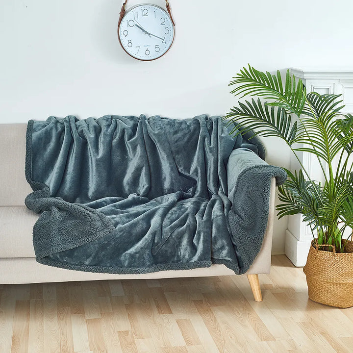 Reversible waterproof pet blanket; a cozy, washable furniture protector and mat for dogs and cats.