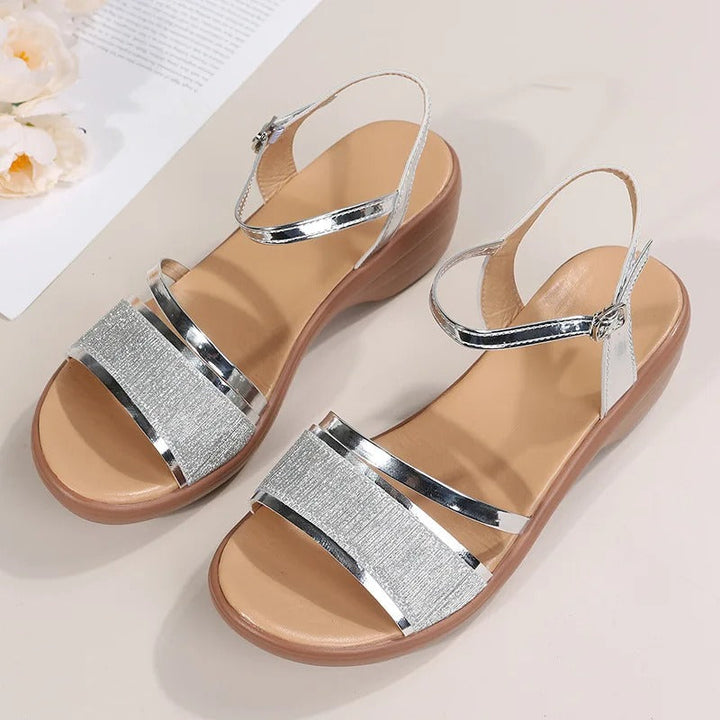 Elegant women's wedge sandals with orthopedic support, ideal for stylish summer comfort & everyday wear.