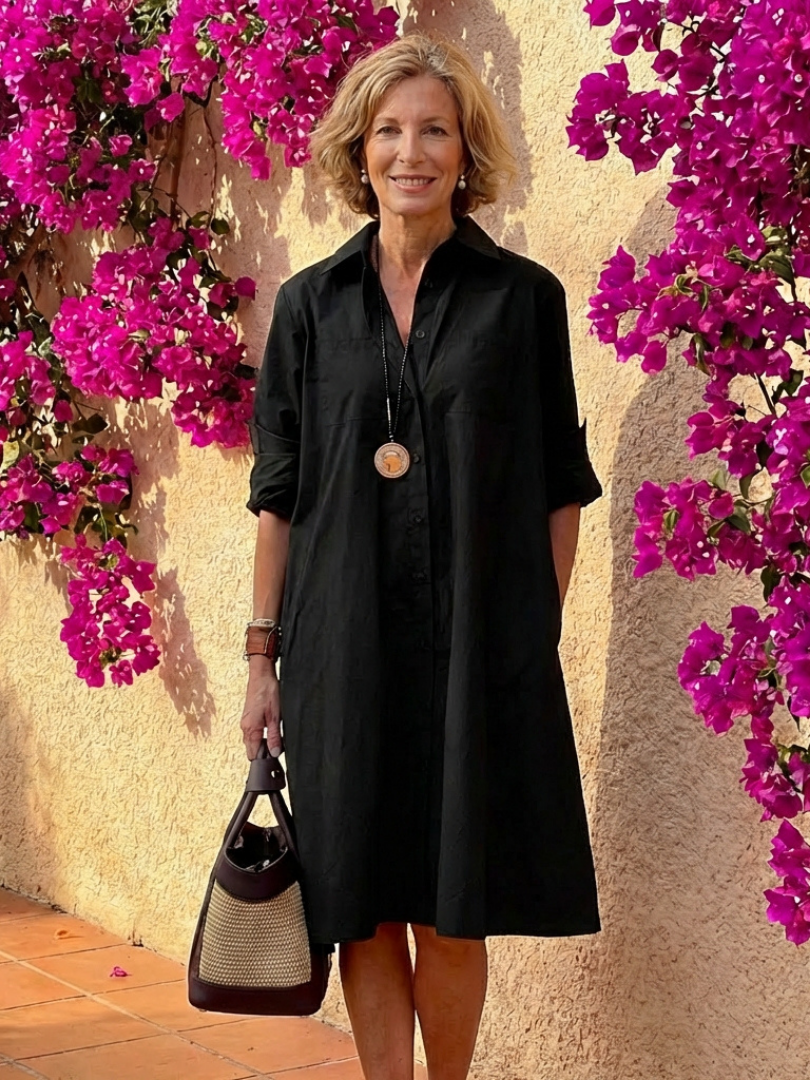Elegant women's collared midi shirt dress with button front, long sleeves & relaxed fit, versatile for travel or casual wear.