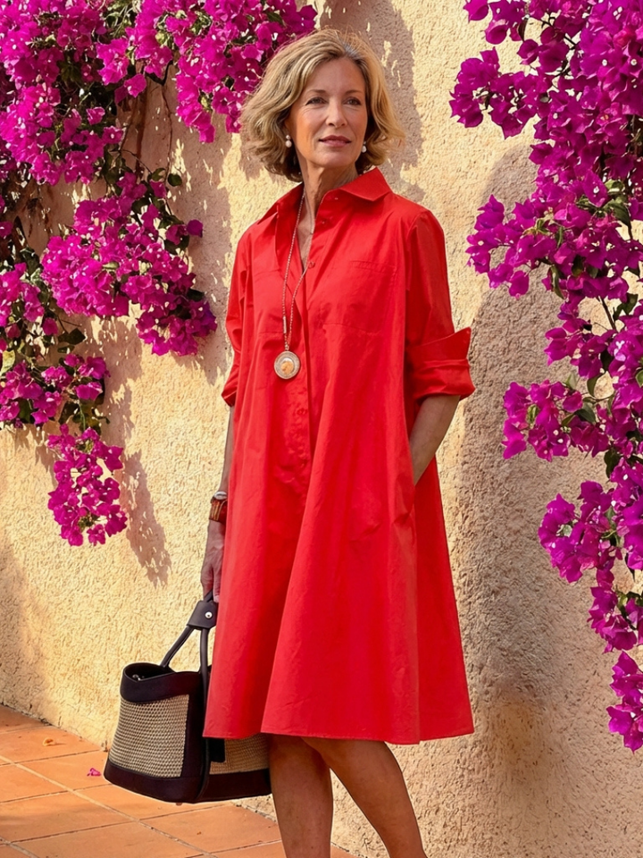 Effortless women's casual midi shirt dress, button front, collared, long sleeves, relaxed fit for comfortable everyday wear.