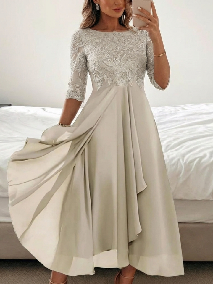 Chic women's midi dress with delicate lace & three-quarter sleeves. A versatile formal or party dress.