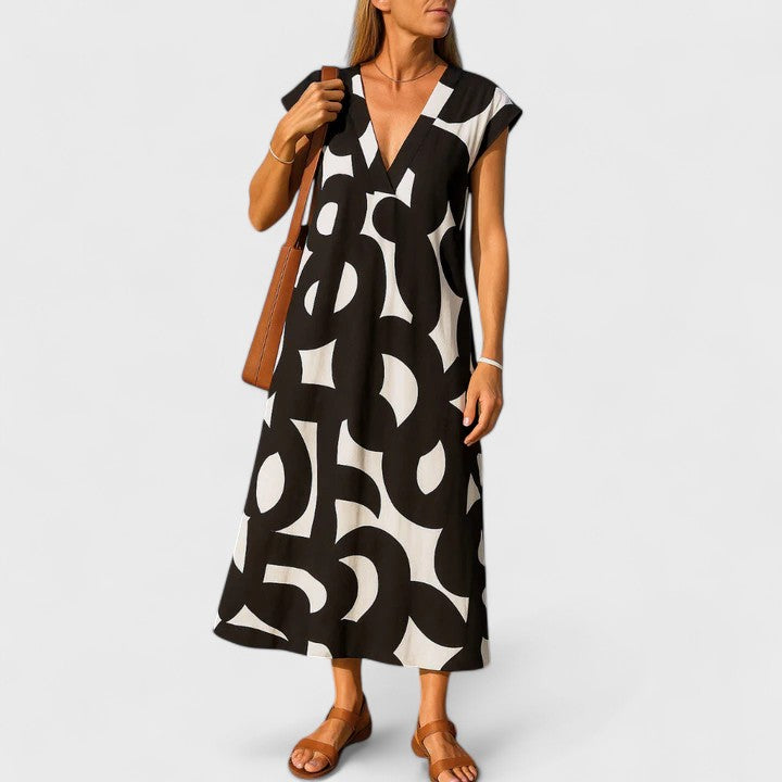 Elegant Women's Flowing V-Neck Maxi Dress, perfect for summer holidays & versatile casual wear. Comfortable.