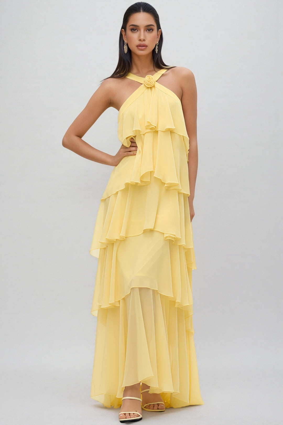 Stunning yellow layered maxi dress featuring a flattering halter neck, great for a wedding guest outfit.