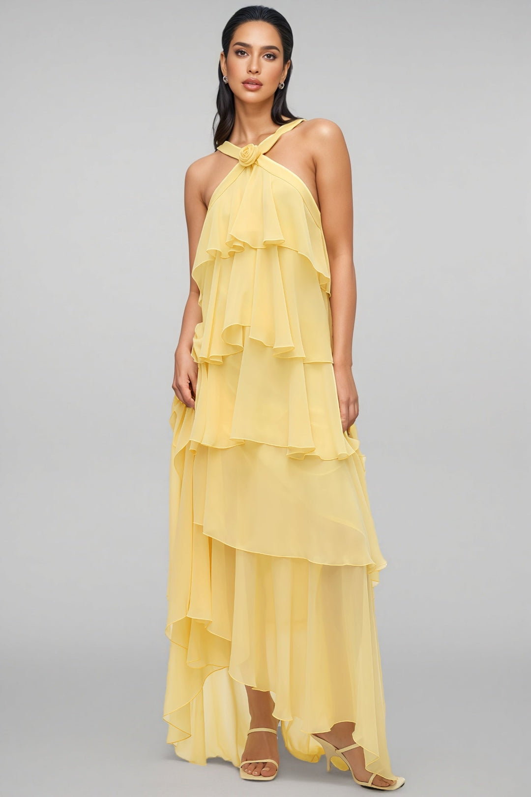 Vibrant yellow maxi dress for women, with a stylish layered skirt & sophisticated halter neckline.