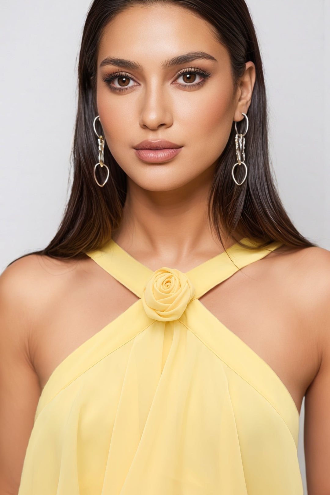 Fashionable women's yellow layered halter maxi dress, an elegant choice for any special occasion or party.
