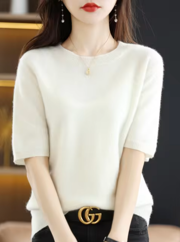 Elegant everyday short-sleeved knit sweater. Women's versatile, slim-fit, and cozy top.
