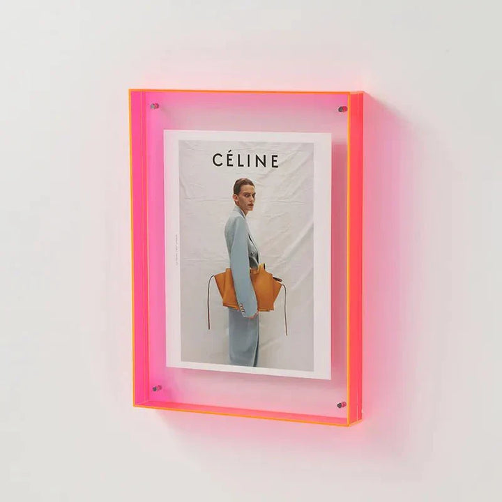 Unique vibrant acrylic picture frame, creating a contemporary, colorful photo display and stylish office decor.