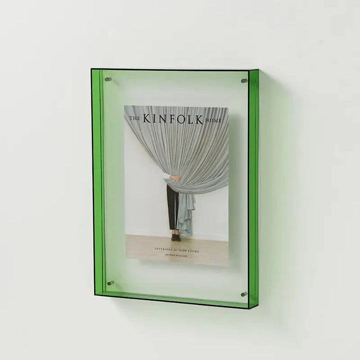 Sleek colorful acrylic photo holder, a modern decor item for vibrant photo display in homes or offices.