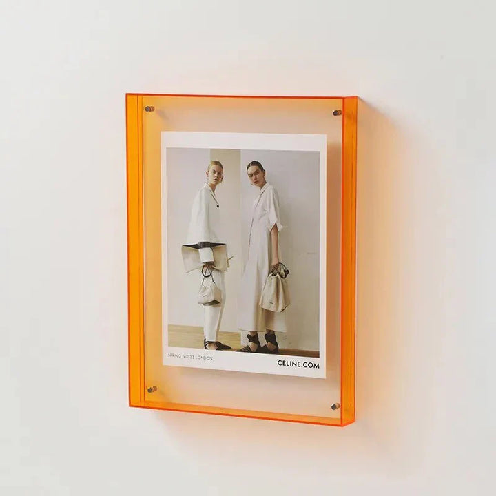 Modern desk or wall display: a vibrant colored acrylic picture frame, perfect for contemporary home or office decor.