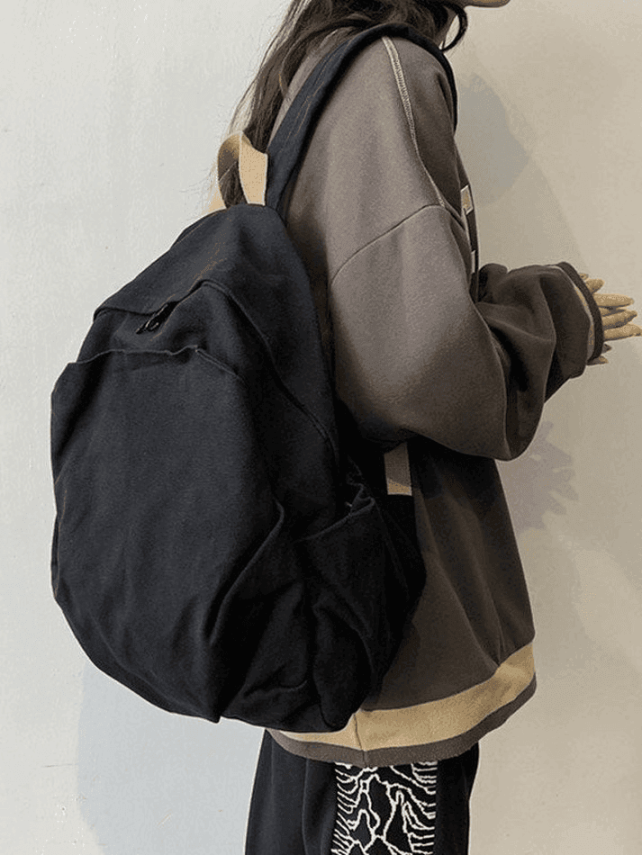 Lilac vintage wash canvas backpack, ideal for college, school, and everyday student carry.