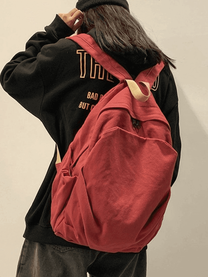 Canvas green vintage wash backpack, ideal college & school bag for students' daily commute.