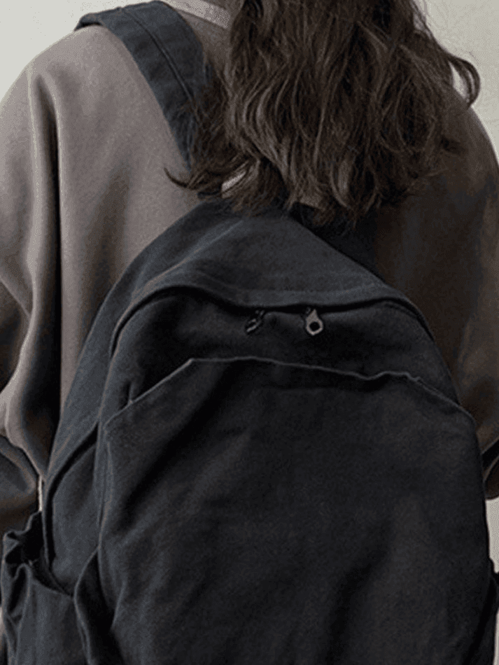 Stylish red vintage wash school backpack, unisex design for students and campus life.