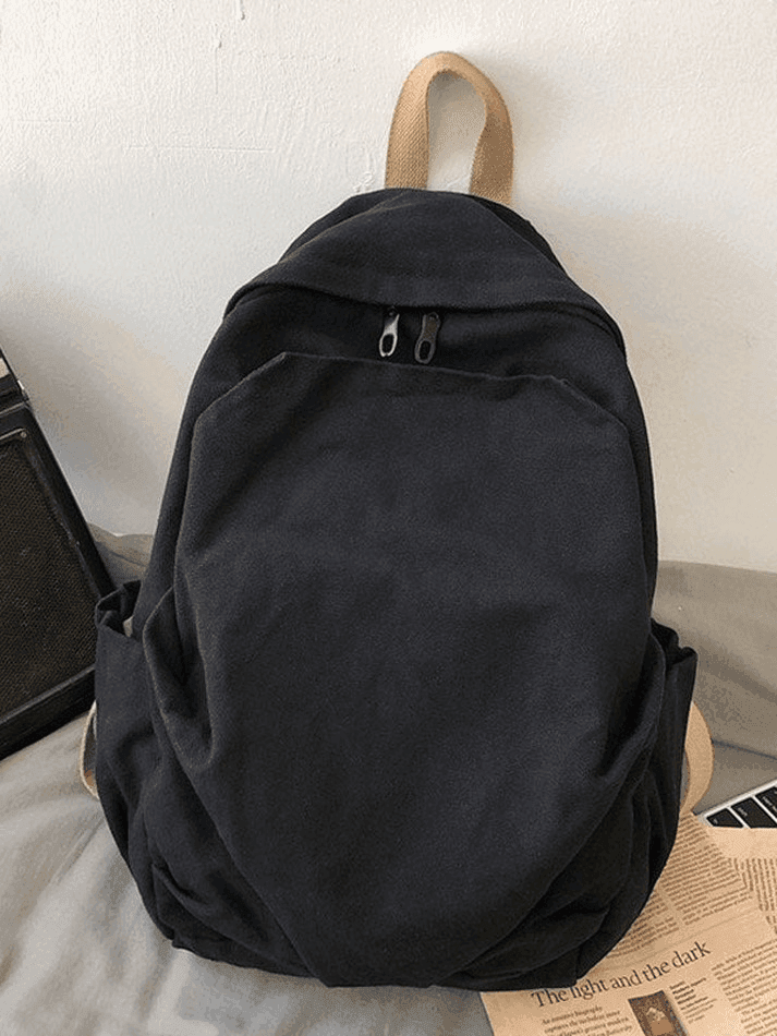 Green vintage wash college backpack, durable canvas school bag for students and daily use.