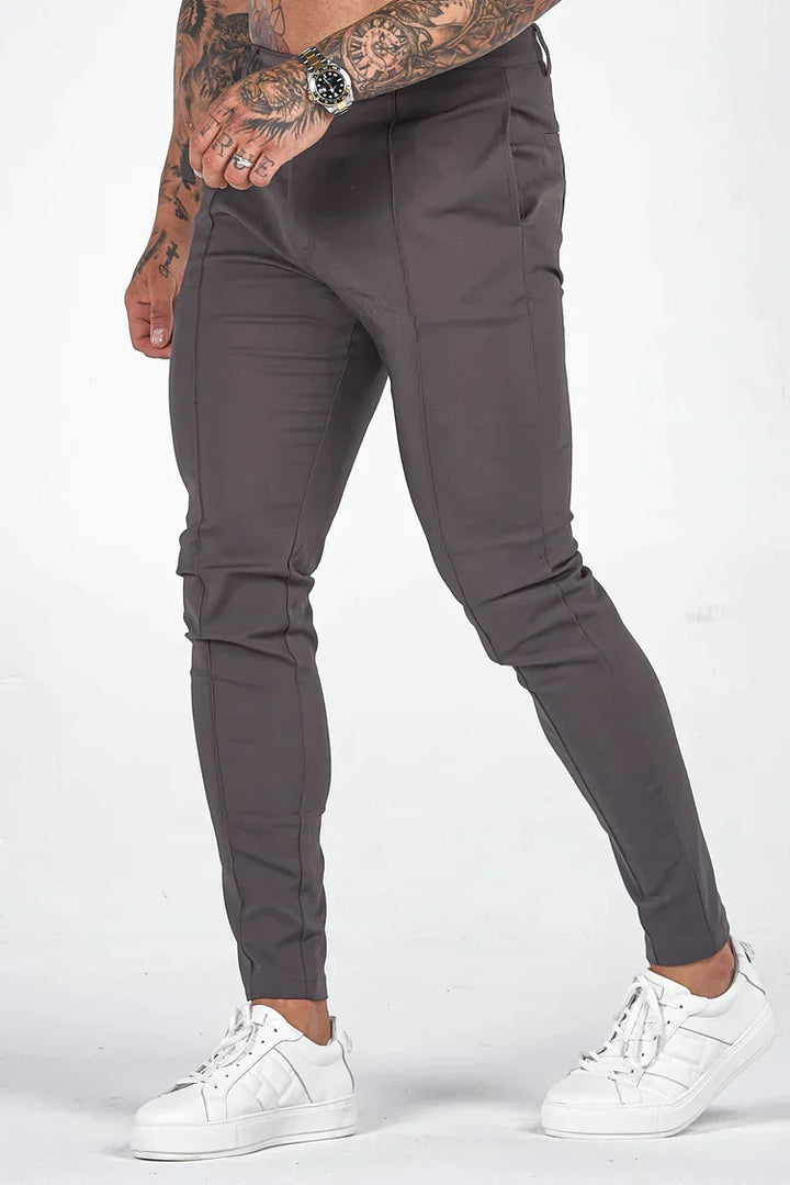 Gray men's slim-fit trousers, versatile for formal or casual outfits & modern men's fashion.