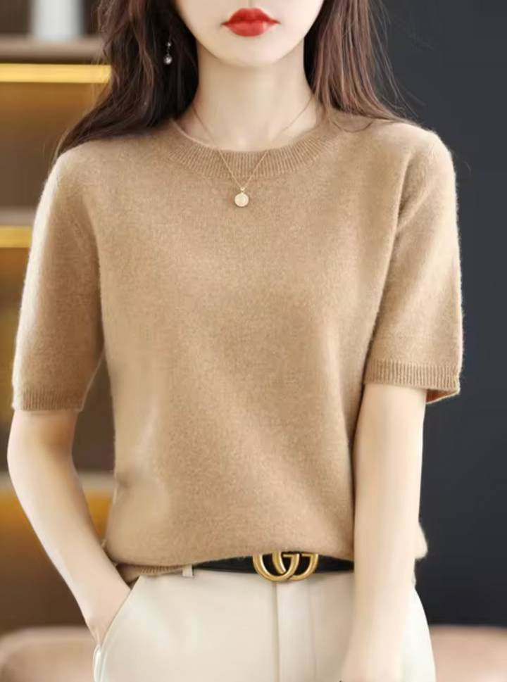 Chic short-sleeved knit top. Women's elegant, cozy, and versatile everyday style layering piece.