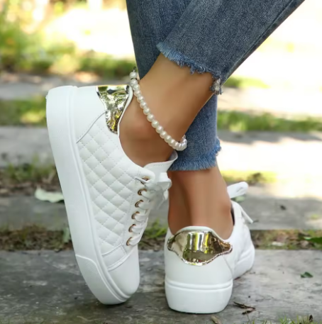 Cushioned women's athletic sneakers with superior arch support, ideal for daily walks and foot pain relief.