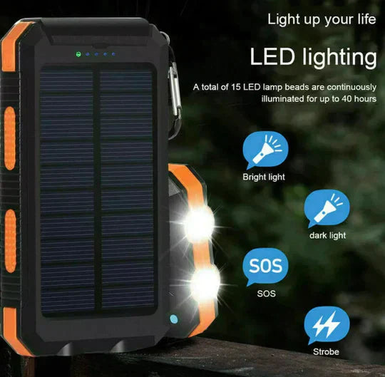 Waterproof 500000mAh solar power bank with dual USB ports, rugged design, ideal for outdoor use and charging devices on the g