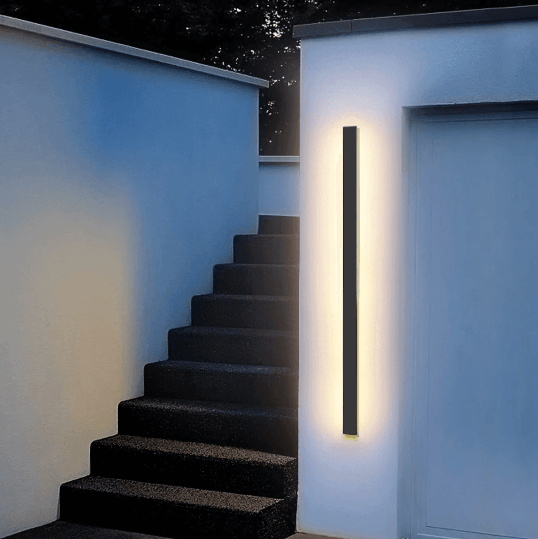 Sleek vertical LED outdoor wall light, modern design, weatherproof aluminum & tempered glass, for home exterior.