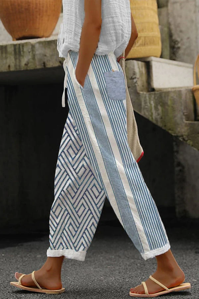 Soft & comfortable women's casual printed pants, designed with practical pockets and elegant button details.