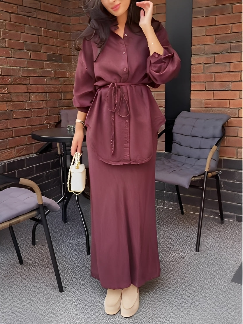 Chic women's long sleeve button shirt and matching tie-waist maxi skirt set for versatile wear.