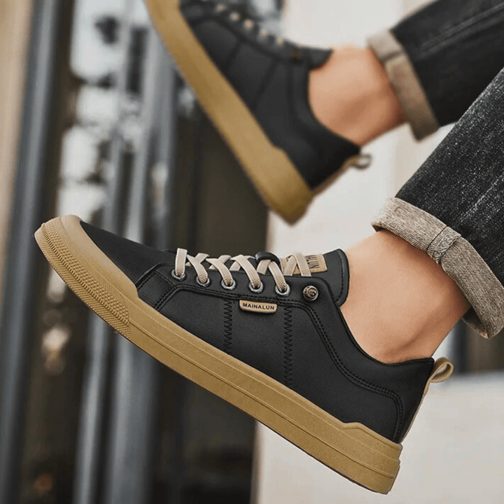 Black men's versatile fashion sneakers, premium everyday low-top shoes for comfort & modern style.