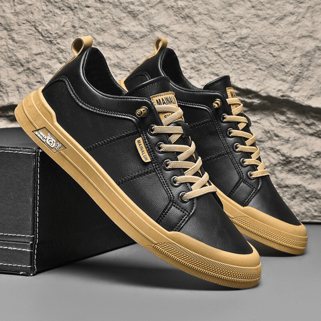 Classic white men's low-top sneakers, offering premium comfort and a versatile casual style.