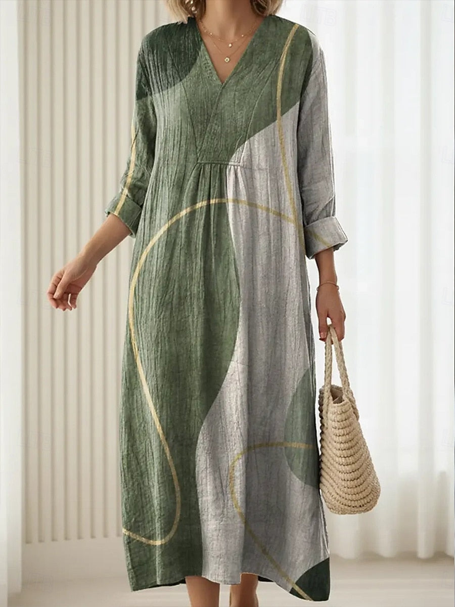 Women's green loose fit midi dress for everyday comfort. Casual, versatile summer & spring fashion.