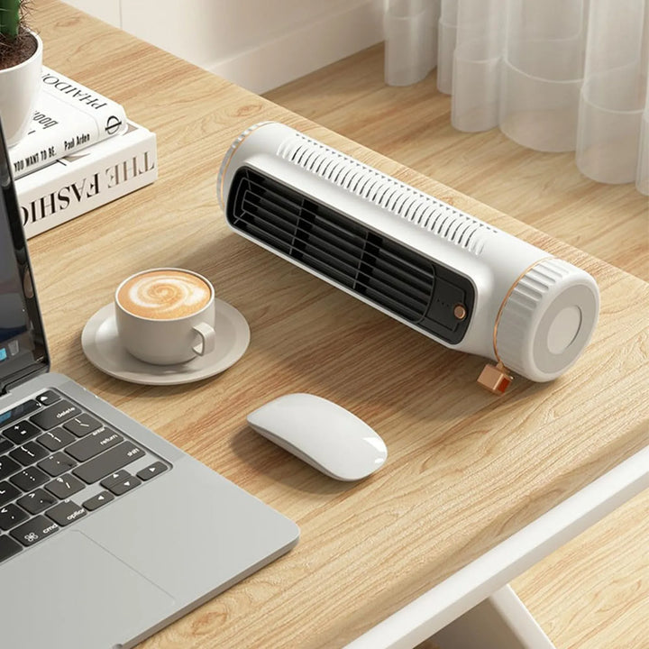Compact bladeless portable fan with USB charging for quiet personal cooling. Perfect for desks & small spaces.