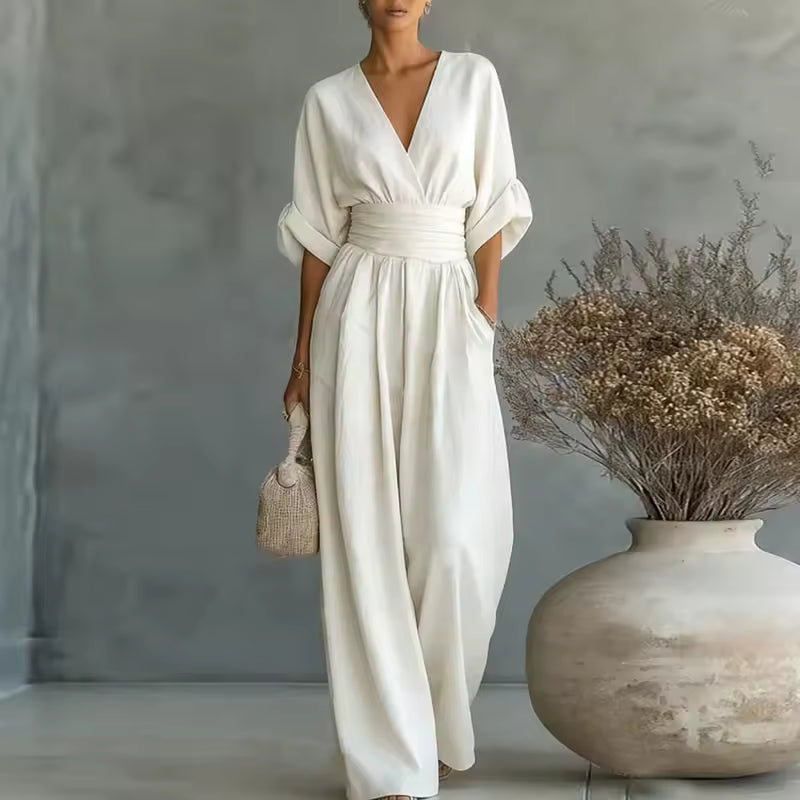Elegant women's deep V-neck wide-leg jumpsuit, perfect for evening wear or stylish parties.