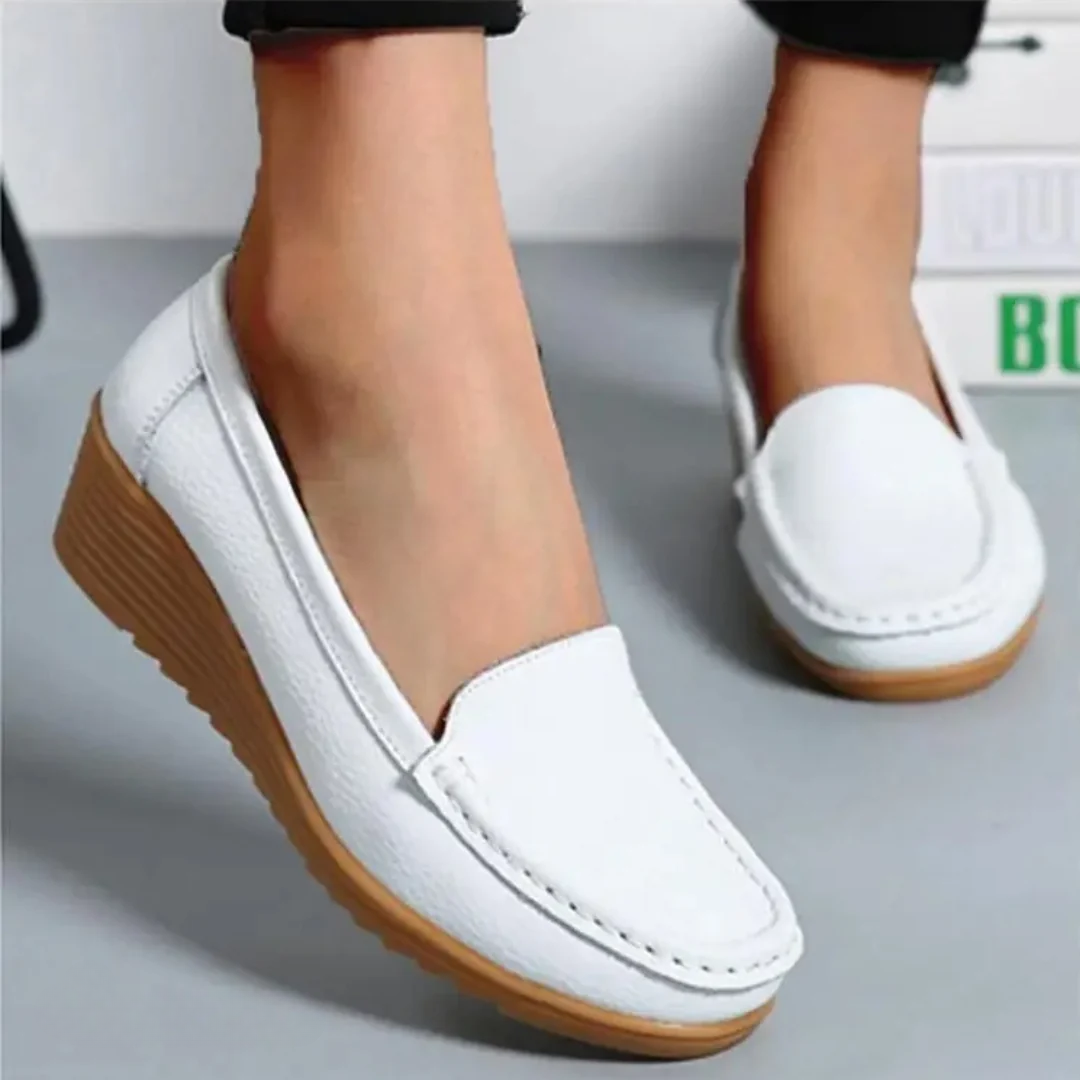 Comfortable women's orthopedic slip-on shoes with arch support for walking and casual everyday wear.
