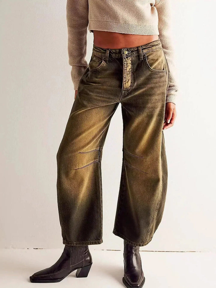 High-waisted wide-leg animal print jeans for women, featuring a trendy leopard pattern.