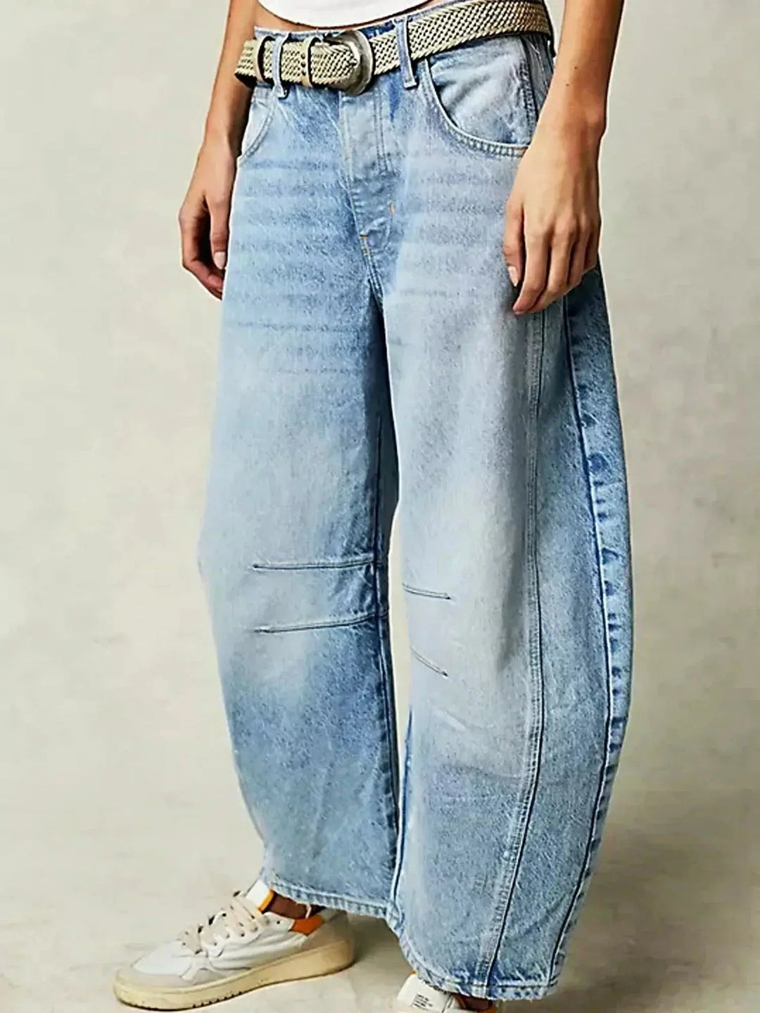 Fashionable women's leopard print wide-leg jeans, high-waisted & chic for a bold look.
