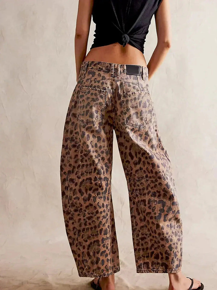Chic women's high-waisted wide-leg leopard print jeans, comfortable animal print pants.