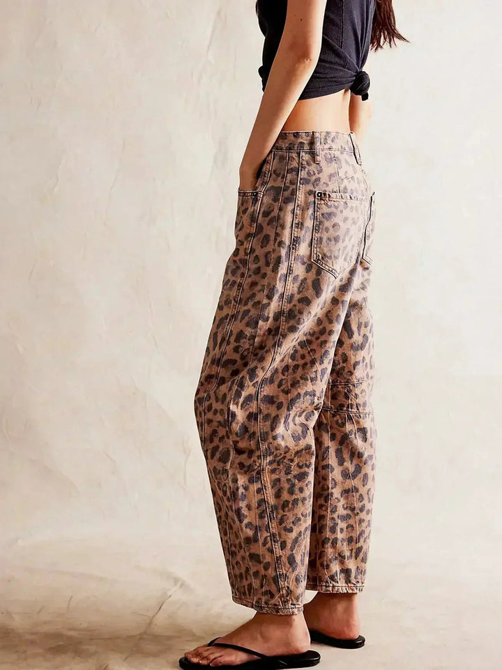 Women's high-waisted wide-leg leopard print jeans, a stylish and comfortable animal print pant.