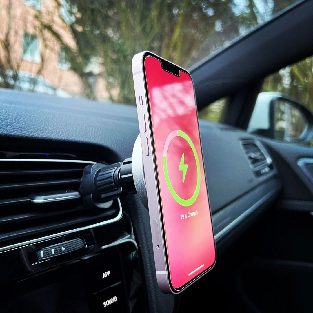 "Wireless MagSafe car charger and phone mount for iPhone, sleek design, strong magnetic hold, seamless interior fit."