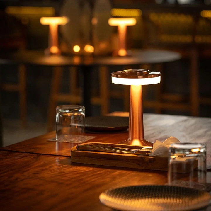 Rechargeable wireless retro table lamp with dimmable light. Perfect portable lighting for indoor & outdoor use.