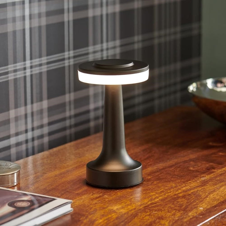 Ambient wireless retro table lamp, dimmable with 3 color temperatures. Stylish home decor & portable lighting solution.