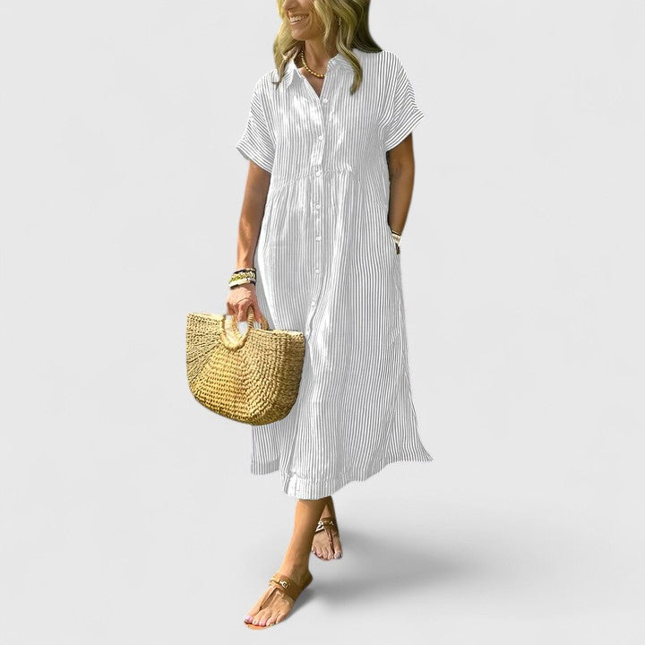 Back view of women's comfortable vertical stripe midi dress, elegant and flattering for everyday style.