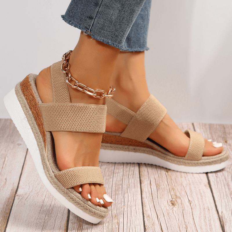 Women's adaptive comfort platform sandals with black stretch straps. Perfect for everyday wear.