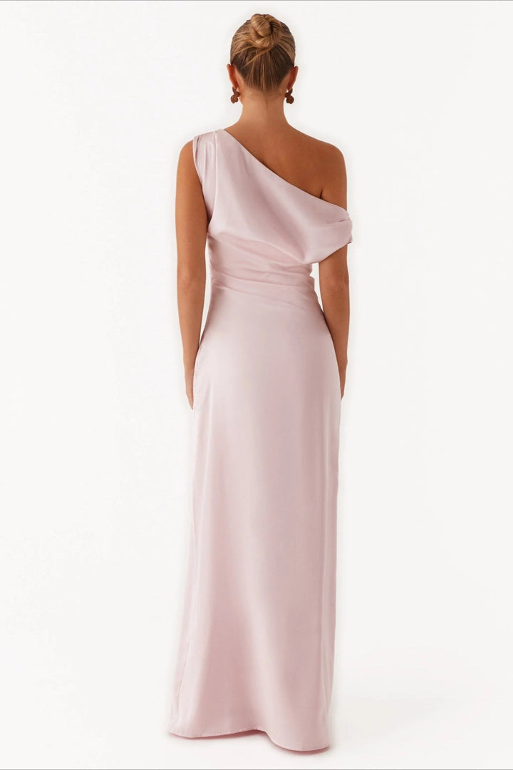 Formal women's evening gown, long, high-waisted, and styled with an asymmetric one-shoulder design.