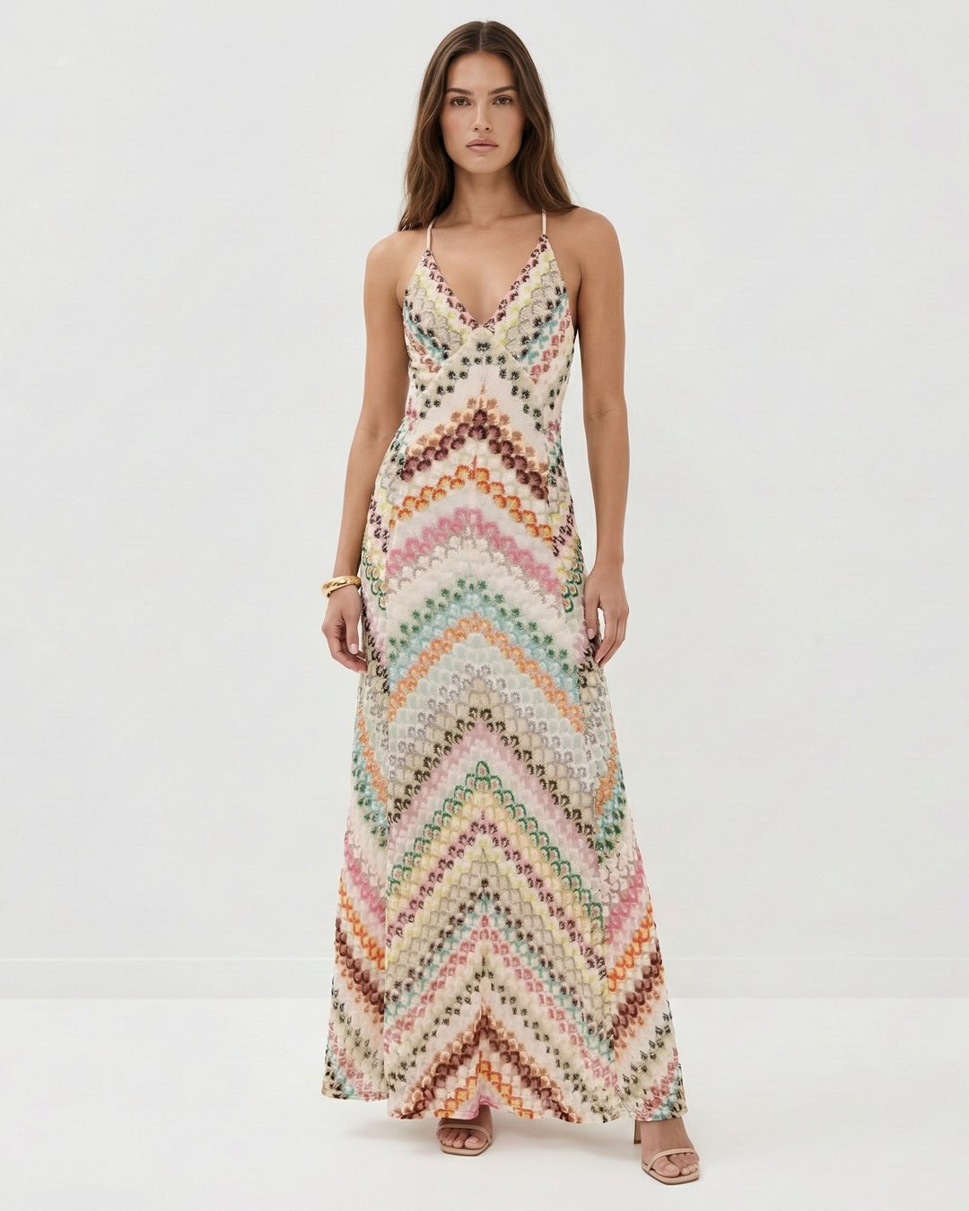 Women's backless V-neck striped maxi dress with spaghetti straps, perfect for summer parties & resort wear.