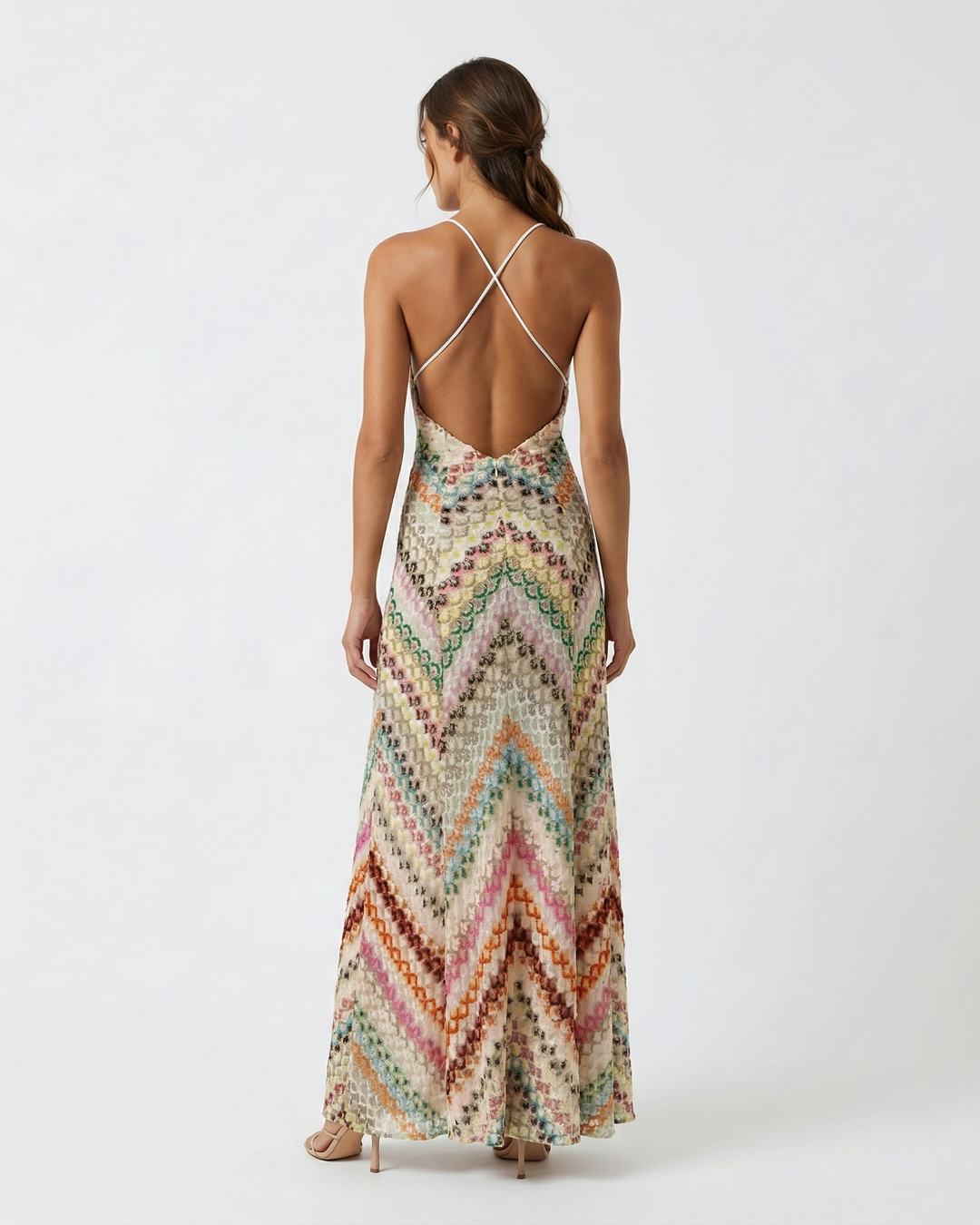 Chic women's striped spaghetti strap maxi dress, featuring a flattering V-neck and stylish backless cut for summer.