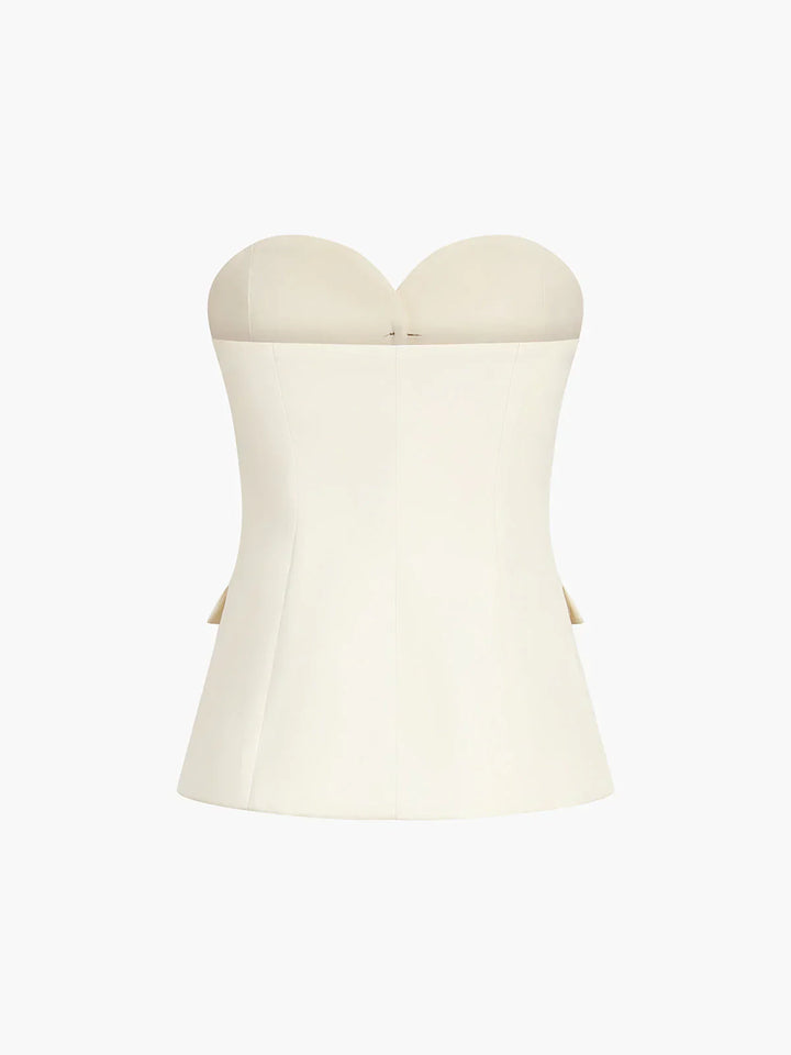 Sophisticated women's beige two-piece set with a structured corset top and wide leg pants.