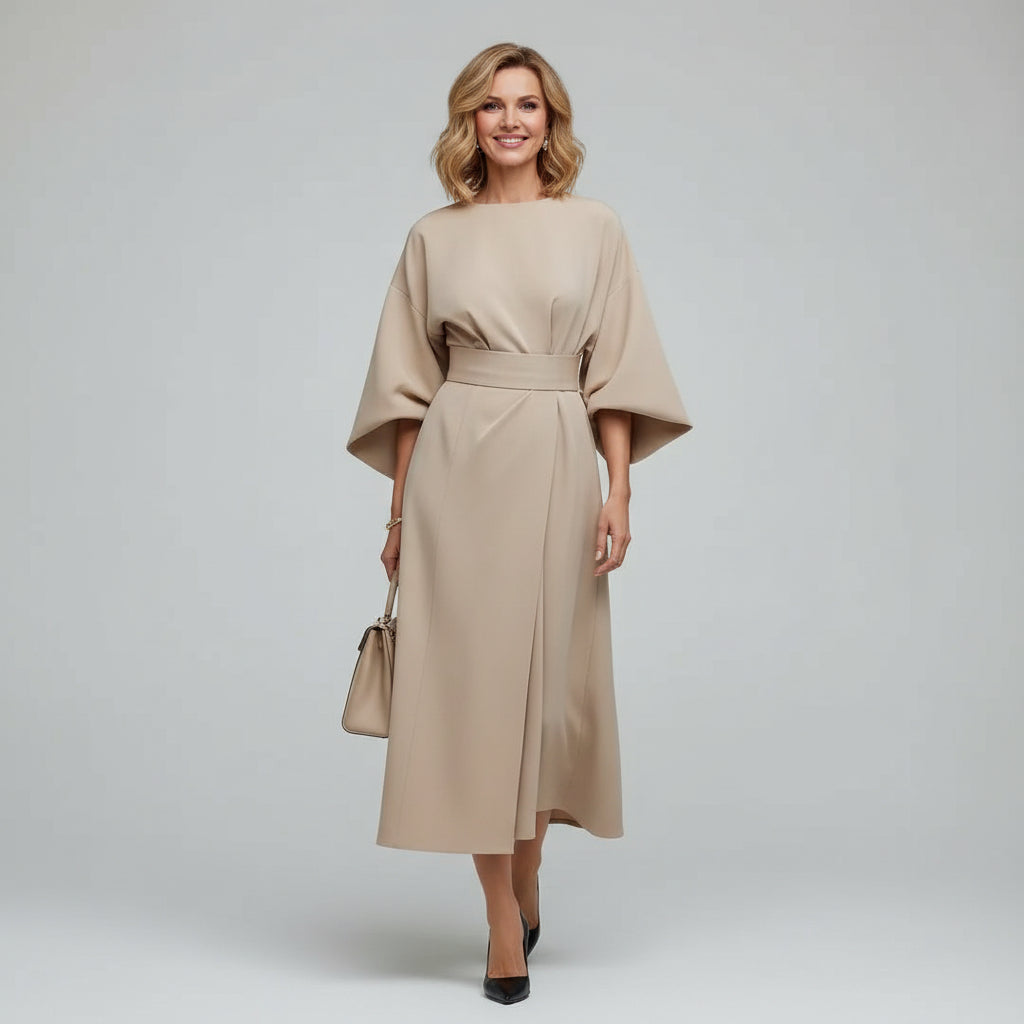 Flowing women's midi dress with a flattering belt and stylish wide sleeves, ideal for day or evening wear.